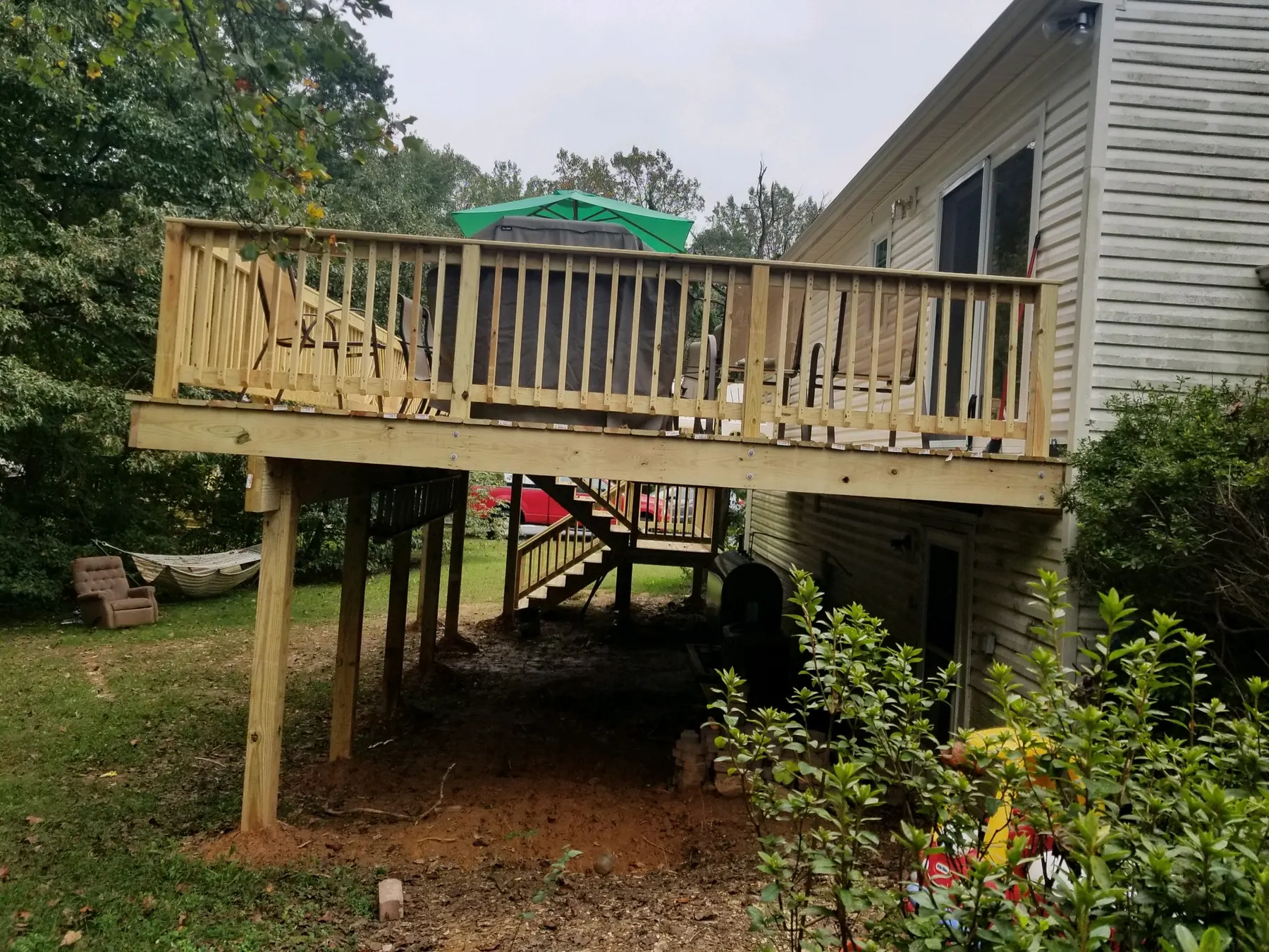Elevated deck attached to the back of the house.